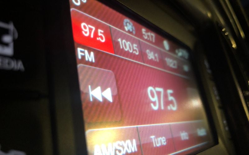 Close-up of the digital radio display in red showing 97.5