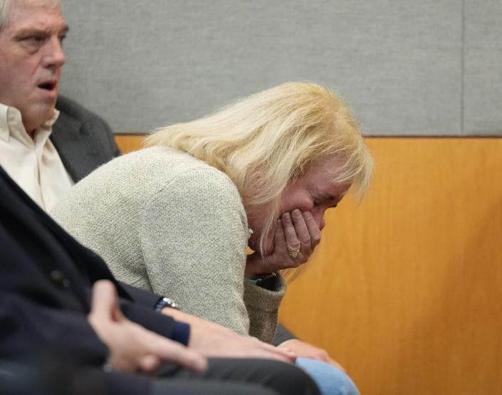 Daniel Perry's mother cries in court on Friday after being convicted of murdering Garrett Foster.