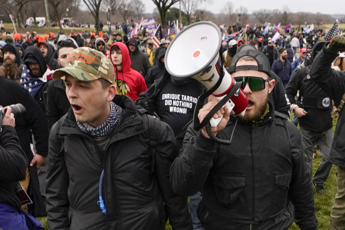 Proud Boys members Zachary Rehl and Ethan Nordean walk to the US Capitol in support of President Donald Trump on January 6, 2021. 