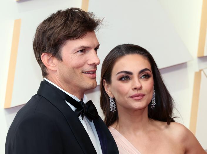 Ashton Kutcher and Mila Kunis attend the 94th Annual Academy Awards at Hollywood and Highland on March 27, 2022 in Hollywood, California.