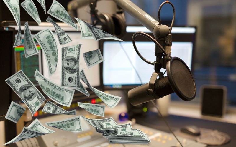 Spending from radio advertisers - a radio studio with money graphics 