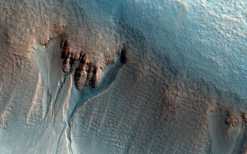 Image of a cliff and gullies taken from orbit.