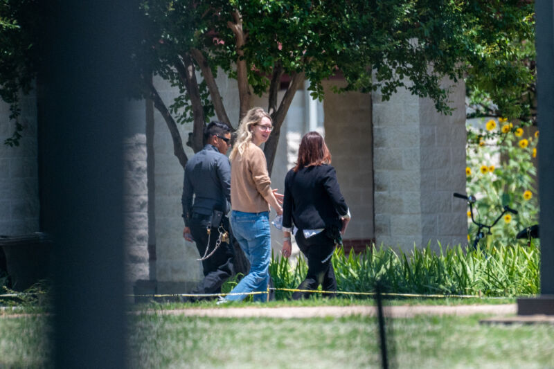 Elizabeth Holmes, founder of Theranos Inc., center, arrives at Federal Prison Camp Bryan in Bryan, Texas, USA on Tuesday, May 30, 2023.