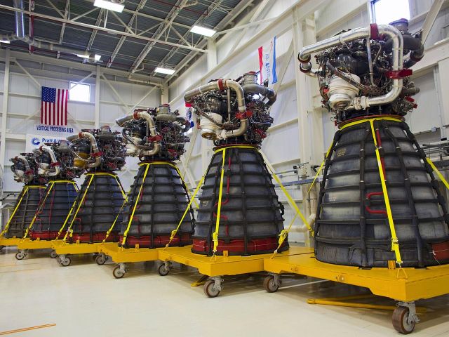 Six of the 18 reusable space shuttle engines NASA has in storage.  Each is used once by the SLS missile and then discarded.