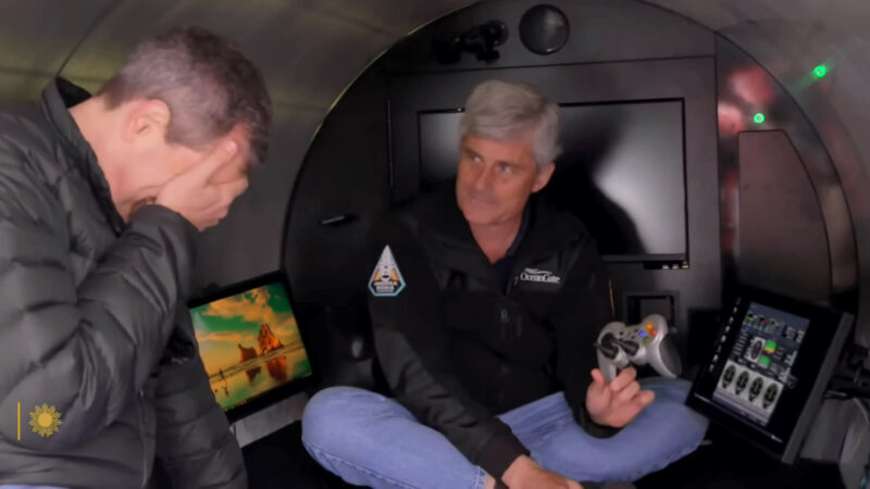 Stockton Rush shows David Pogue the game controller used to control the OceanGate Titan submarine during a CBS Sunday Morning broadcast in November 2022.