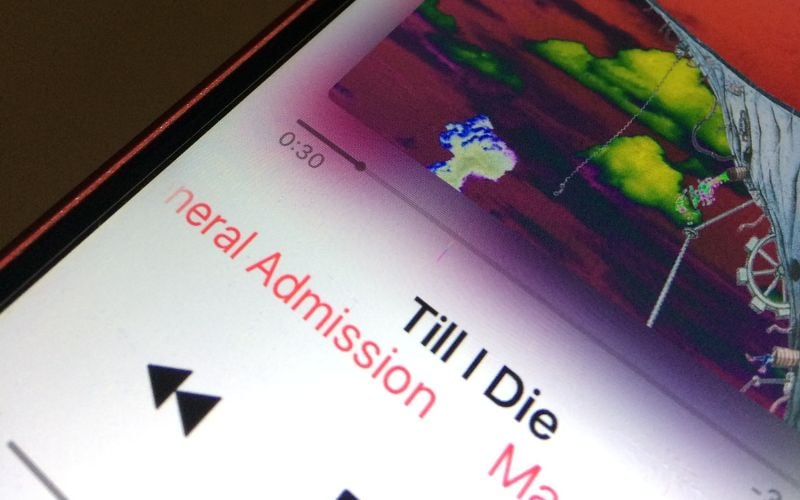 Apple Music is playing a song called "Till I die"