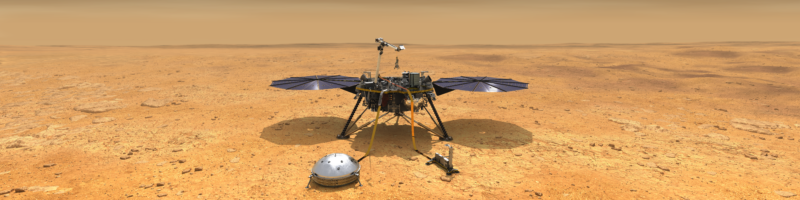 Image of a lander on a dry, reddish planet, with two circular solar panels and a number of instruments.