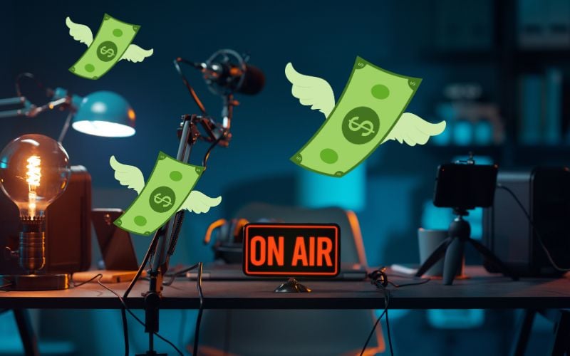 Radio station with stacks of dollars of different sizes, wings floating away