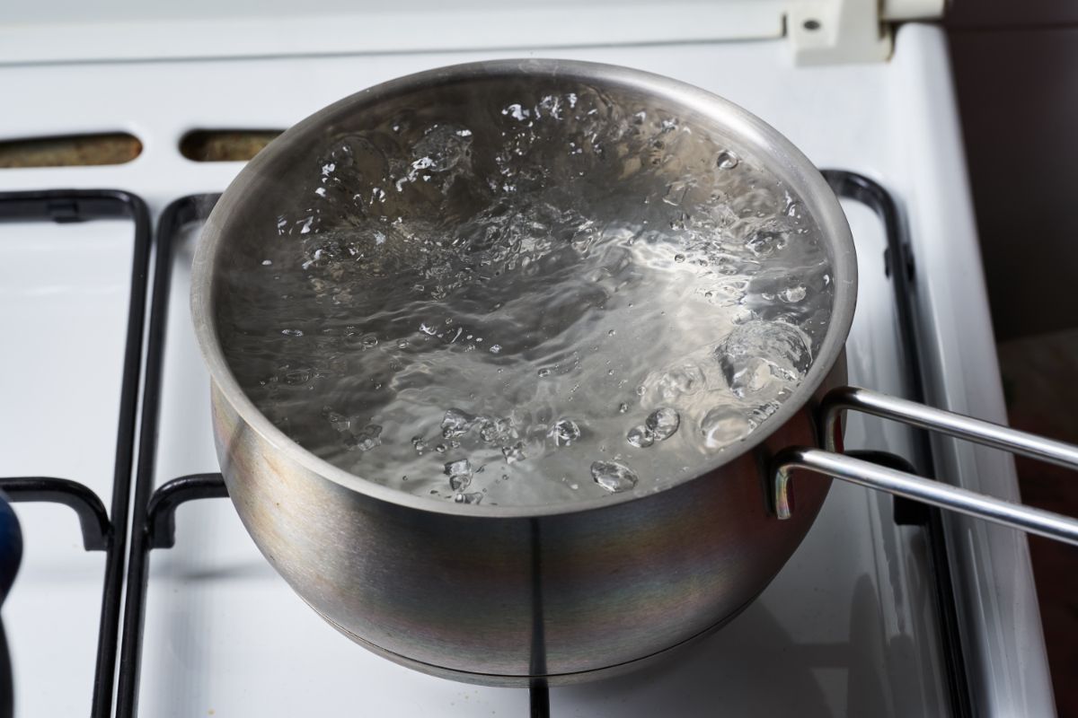 Pot with water boiling